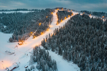 Ski Slope and Resort in Kotlenica,Bania at Evening from Drone