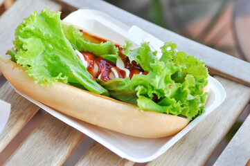 hot dog, pork sausage or sausage roll or breaded sausage .