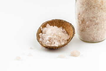 Bunch of bath sea salt in coconut shell
