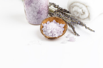 Lavender bath salt in a glass jar with flowers