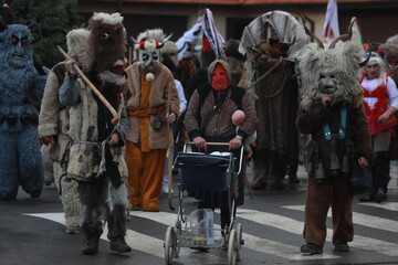Godech, Bulgaria - January 1, 2022: Mummers in traditional costumes toured the streets of Godech on...