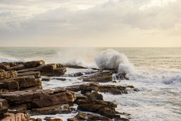 waves crashing on rocks