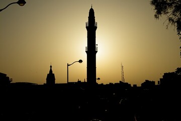 Beautiful and dramatic silhouette of a Mosque from Jaffa Yafo Tel Aviv during sunrise. High quality photo