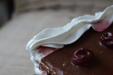 delicious Black Forest cake with chocolate, whipped cream and cherry filling