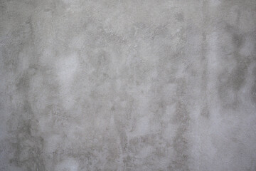 Naklejka premium Concrete wall of grey color, cement texture background .
