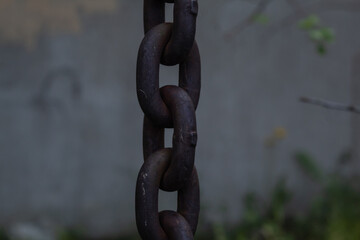 Naklejka premium Large metal chain for lifting loads. Links of a metal chain