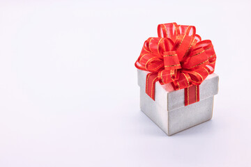 White gift box tied with red bow, Isolated on a white background, Merry Christmas.