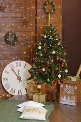 Christmas tree in xmas decorated room with clock, presents, garlands and Cristmas decoration