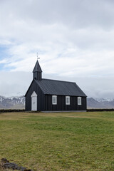 Iceland Black Church of Budir with overcast skies in the fall season