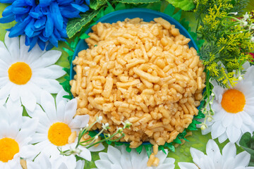 Chak-chak - flour oriental cookies. A table decorated with flowers.