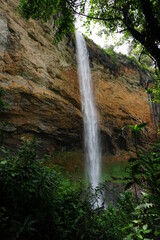 One of the Sipi Falls at Mount Elgon National Park in between lush vegetation