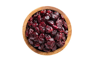 dried cranberries in wooden bowl isolated on white background. Vegan food, top view.