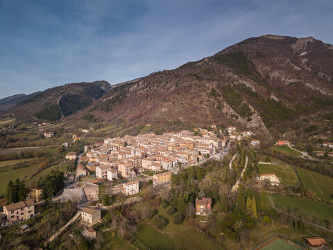 aerial view of the medieval village of Costacciaro at the foot of Montecucco in the province of Perugia region of Umbria Italy