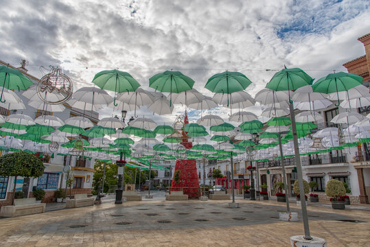 Christmas time in Torrox Spain with colorful umbrellas - feliz navidad