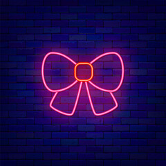 Pink bow neon icon. Present concept. Outer glowing effect banner. Holiday design on brick wall. Vector illustration