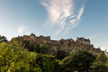 Fototapeta na wymiar Edinburgh Castle against a blue sky with wispy clouds
