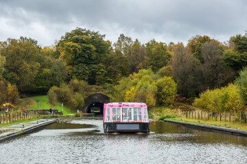 The Falkirk Wheel is a rotating boat lift in Falkirk, Scotland, connecting the Forth and Clyde Canal with the Union Canal.