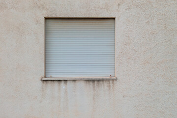 Damaged Building Facade with Window