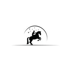 silhouette of a person riding a horse