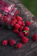 raspberries on wooden background