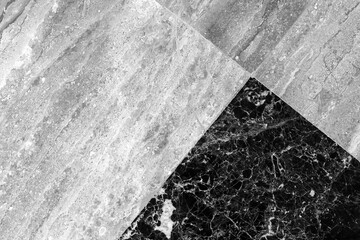 Marble floor tiling with black and white tiles, close up