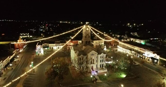 Drone video of Texas Courthouse with Christmas Lights