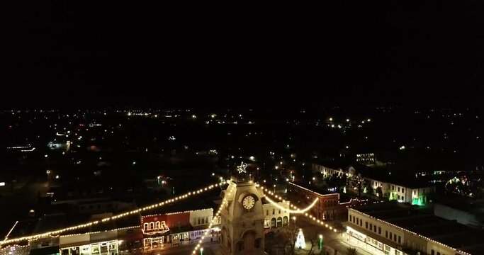 Drone going down and Texas Courthouse with Christmas Lights