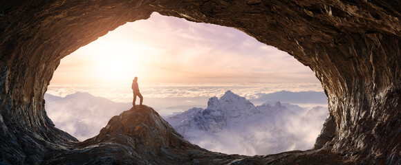 Dramatic Adventurous Scene with Man standing inside a Rocky Cave Landcspae. 3d Rendering. Sunset Sky. Aerial Mountain Image from British Columbia, Canada. Adventure Concept