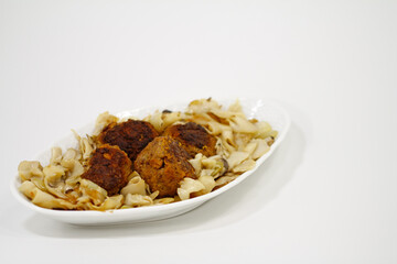 homemade fricadelle with fried herb seitlings