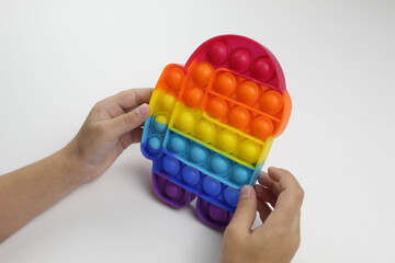 Anti-stress game. pop it. The child is bursting with anti-stress. Cheerful childhood. Simple dimple.