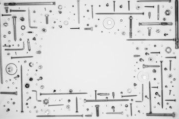 Screws and washers on white background