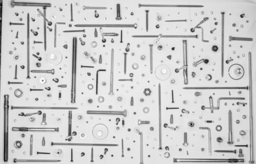 Screws and washers on white background