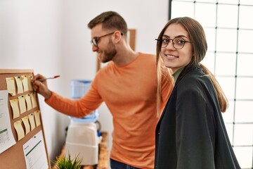 Two caucasian business executives working at the office.