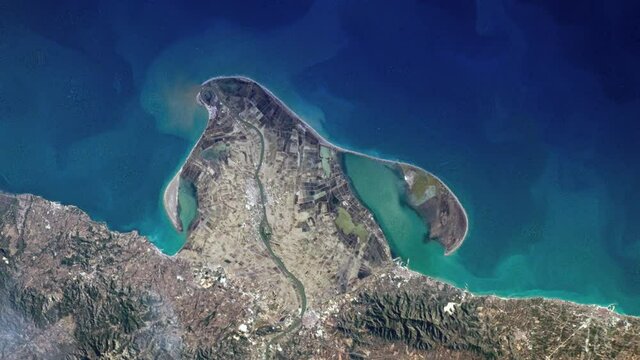 Flying over Ebro river delta, aerial satellite view from space of Spain coast Mediterranean sea sunrise animation. Based on image furnished by Nasa