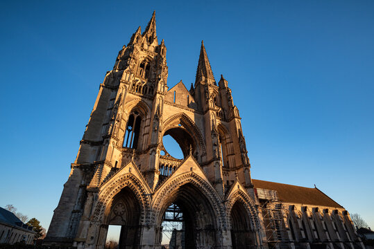 The Abbey of Saint Jean des Vignes at sunset, in Soissons, France. Listed historic monument, only ruins remain, of which the west facade remains one of the more outstanding examples of architecture.