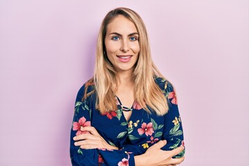 Young caucasian woman wearing casual clothes happy face smiling with crossed arms looking at the camera. positive person.