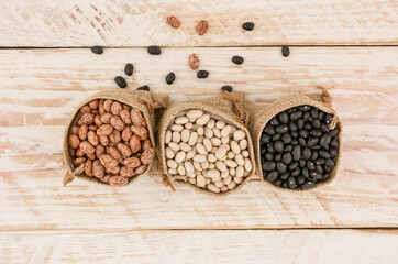 Food background of healthy dried black,brown and white  beans