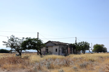 abandoned house in the countryside with graffiti 