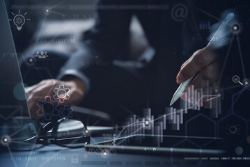 Data scientists. Business Intelligence, software development. Woman programmer using laptop analyzing various information on futuristic virtual interface screen