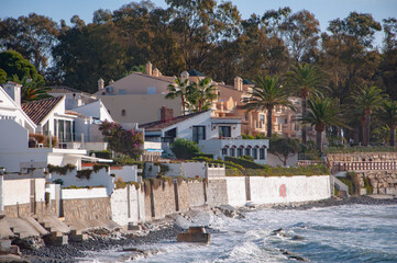 A typical street in old city Estepona with colorful flower pots. Estepona, Andalusia, Spain