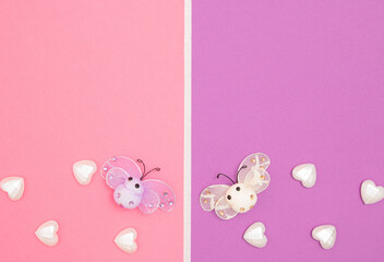 Colorful background with butterfly and hearts. Love or Valentine's day concept. Flat lay.