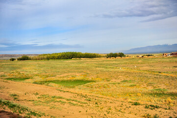 The boundless natural scenery of the Gobi Desert grassland and pasture in Xinjiang, China