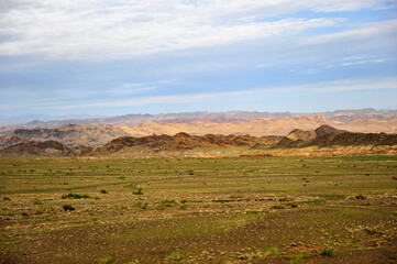 The boundless natural scenery of the Gobi Desert grassland and pasture in Xinjiang, China