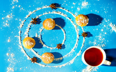 homemade fresh muffins or cupcakes placed on orbit ways as planets, universe baking concept, creative cooking ideas and design