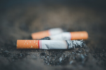 Cigarette burning from smoker addictive nicotine
