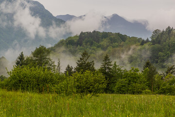 Julian Alps rainy and misty landscape near Bovec village, Slovenia