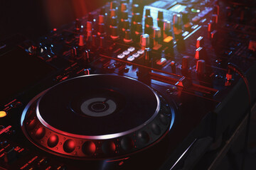 Fototapeta na wymiar Closeup view of modern DJ controller on dark background