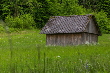 Fototapeta na wymiar Barn at a meadow near Bled, Slovenia
