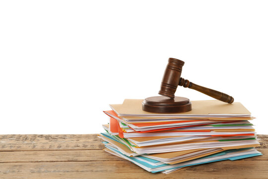 Stack Of Different Files With Documents And Gavel On Wooden Table Against White Background. Space For Text