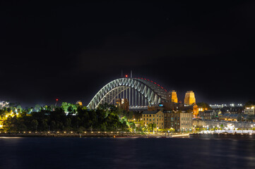 Naklejka na ściany i meble Sydney Harbour Bridge New Years Eve fireworks, colourful NYE fire works lighting the night skies with vivid multi colours